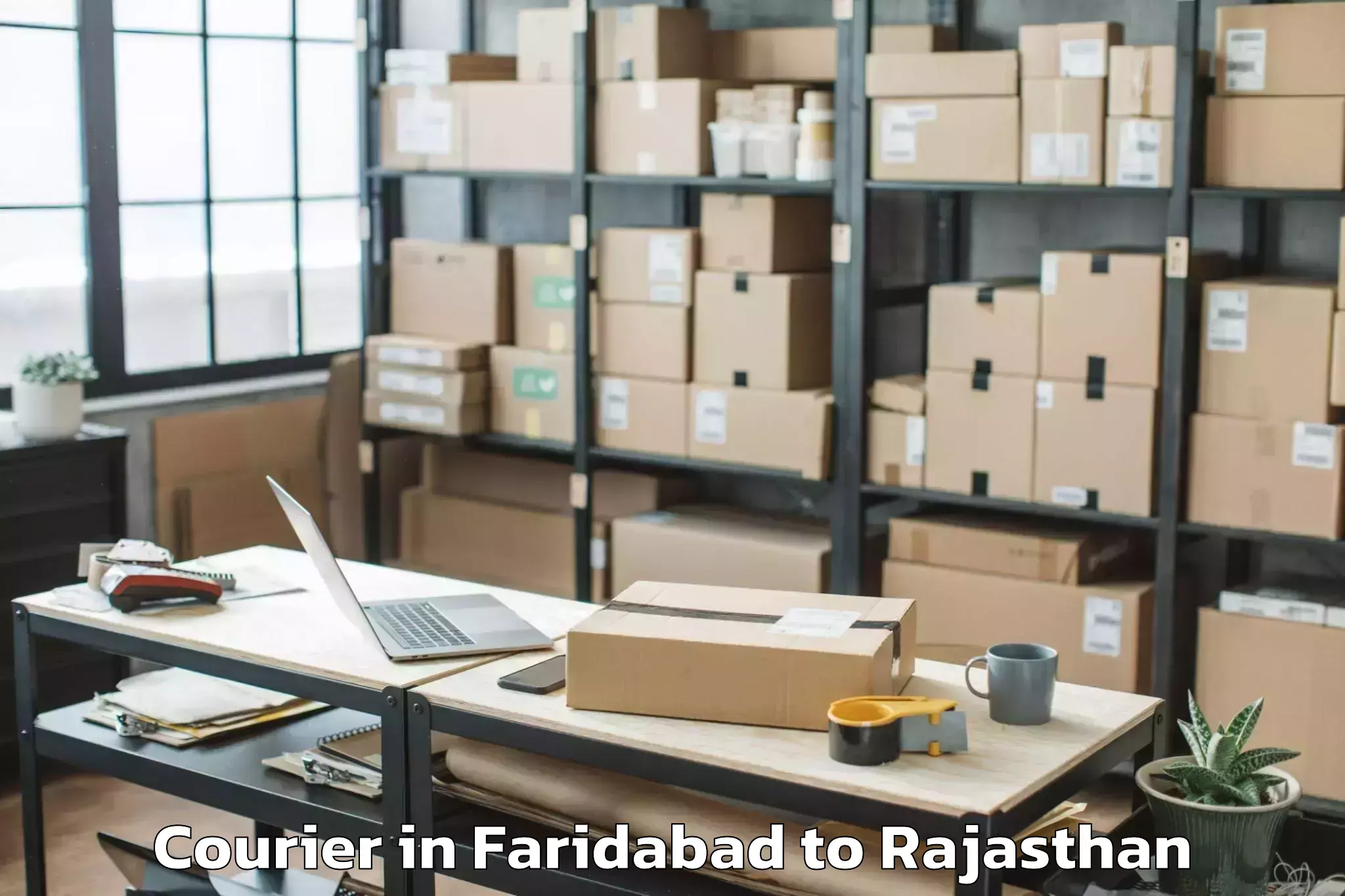 Get Faridabad to Sunrise University Alwar Courier